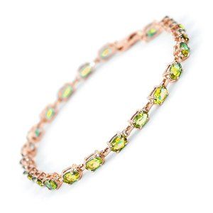 14K. SOLID GOLD TENNIS BRACELET WITH PERIDOTS